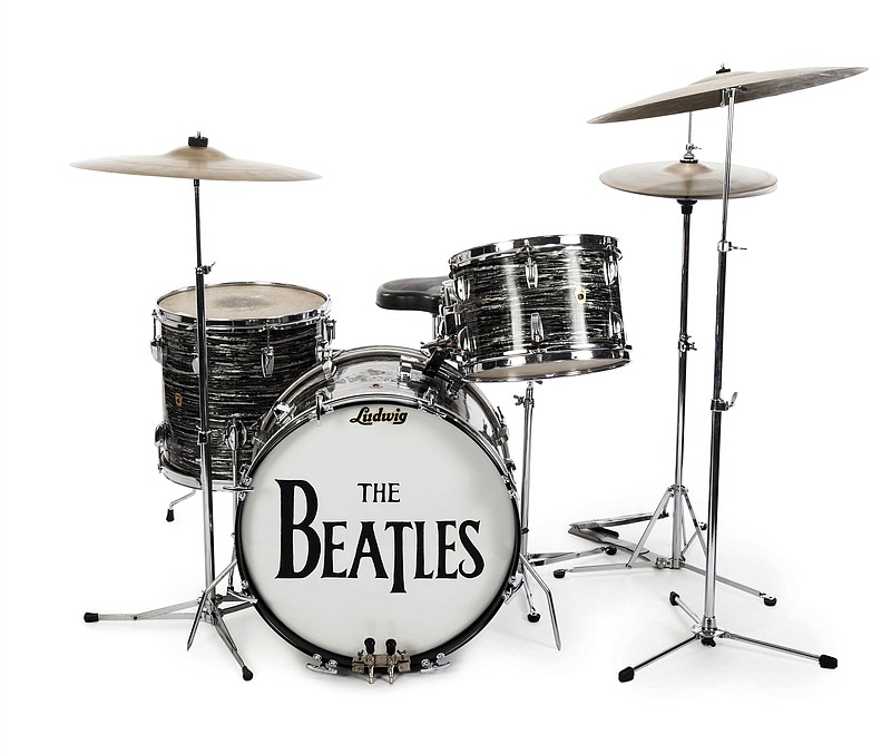 
              This undated photo provided by Julien's Auctions shows Beatle Ringo Starr’s first 1963 Ludwig Oyster Black Pearl three-piece drum kit, used by Starr in more than 200 performances in 1963 and 1964. The set was used to record some of the Beatles' biggest hits, including “Can’t Buy Me Love,” “She Loves You,” “All My Loving,” and “I Want to Hold Your Hand." More than 800 items owned by Starr and his wife, Barbara Bach, are going to auction. The unprecedented number of Beatles-owned objects will be offered Dec. 4-5, 2015, at Julien's Auctions in Beverly Hills, Calif. (Julien's Auctions via AP)
            