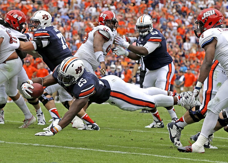 Auburn sophomore running back Peyton Barber, shown scoring the deciding touchdown in last Saturday's win over Jacksonville State, has been a bright spot in an otherwise troubling start for the Tigers.
