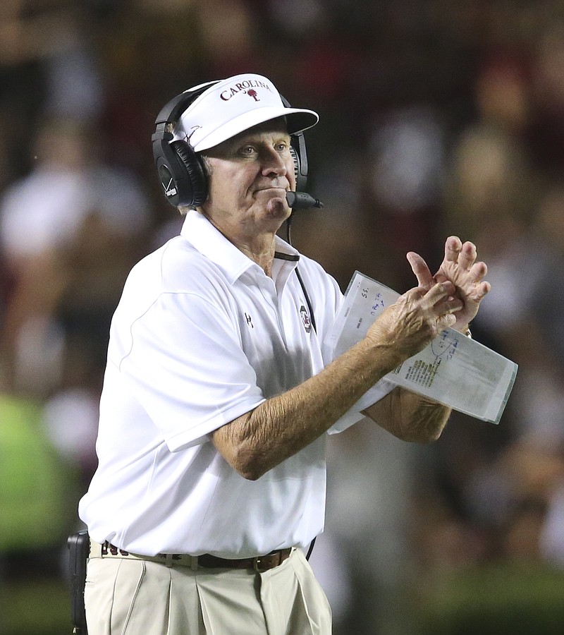South Carolina head coach Steve Spurrier calls for a timeout in the second half of an NCAA college football game against Kentucky, Saturday, Sept. 12, 2015, in Columbia, S.C. Kentucky won 26-22. (AP Photo/John Bazemore) 