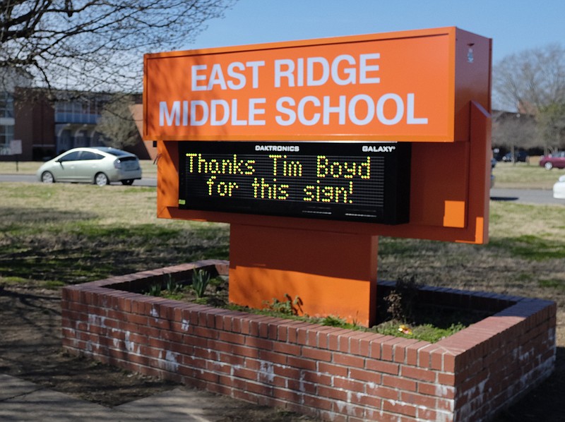 This sign at East Ridge Middle School was paid for with Hamilton County tax dollars and gives provides a free advertisement and name recognition for the commissioner whose "discretionary" funds paid for it.