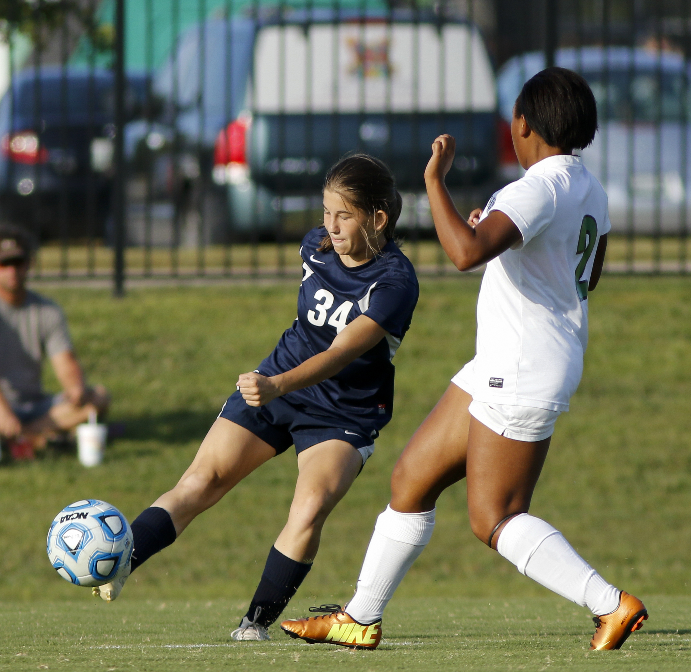 Soddy-Daisy's Summer Ghaffari, left, crosses the ball ahead of East Hamilton's Ryleigh Fleming during their prep soccer match Tuesday, Sept. 15, 2015, at East Hamilton High School in Chattanooga, Tenn.