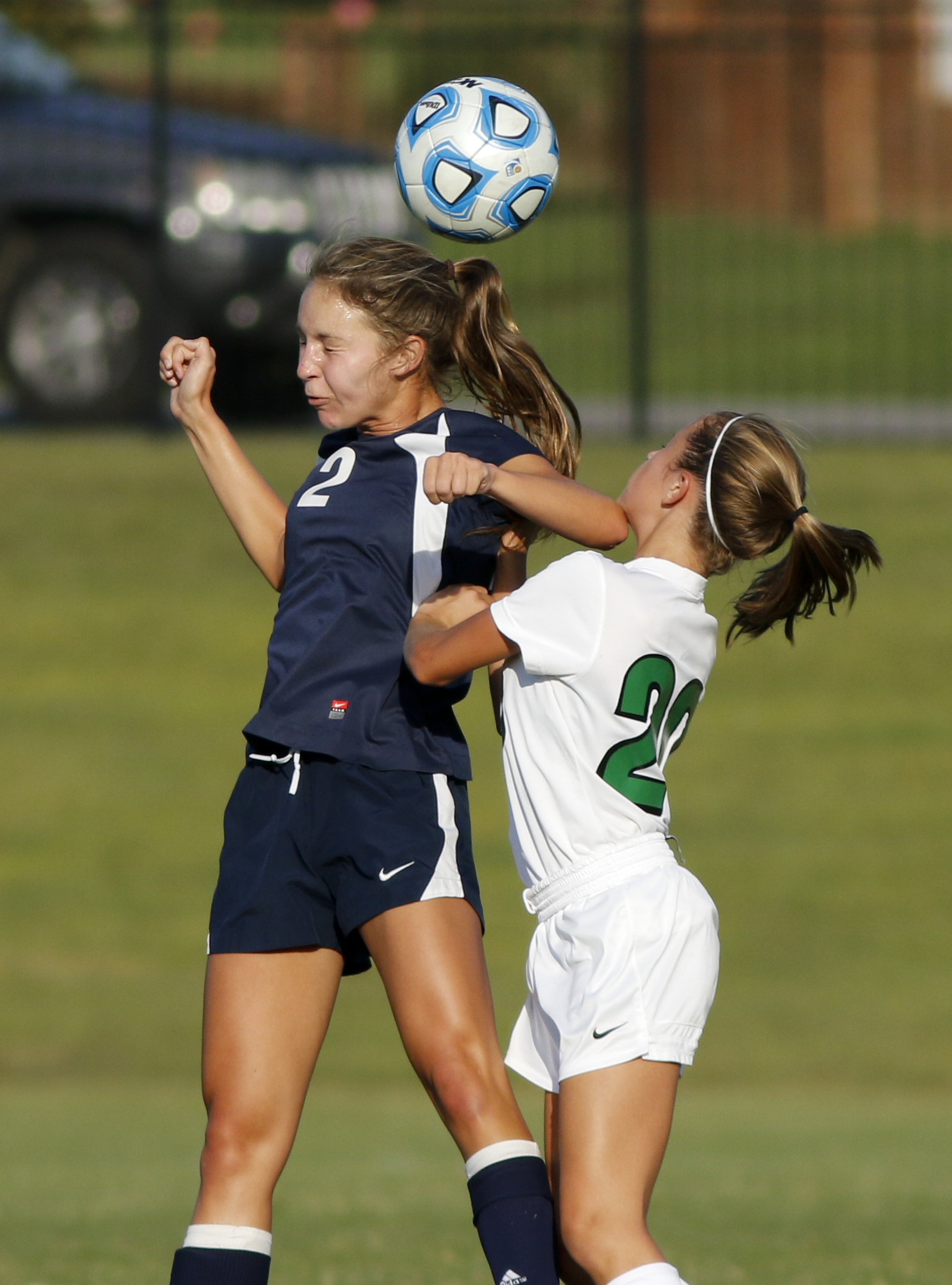 Soddy-Daisy's Kelsey Henry, left, heads the ball next to East Hamilton's Gabby Larson during their prep soccer match Tuesday, Sept. 15, 2015, at East Hamilton High School in Chattanooga, Tenn.