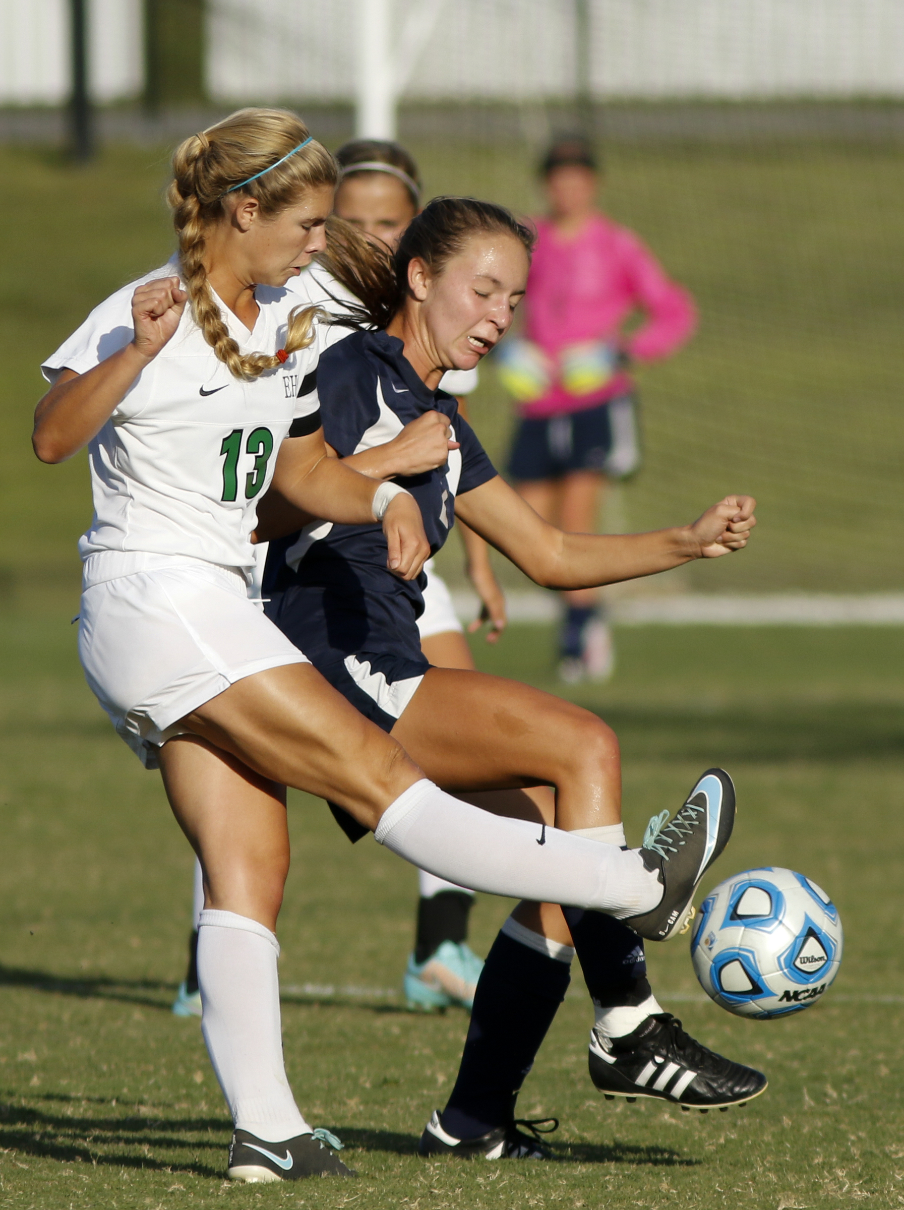 East Hamilton's Camryn Harris, left, collides with Soddy-Daisy's Kelsey Henry during their prep soccer match Tuesday, Sept. 15, 2015, at East Hamilton High School in Chattanooga, Tenn.