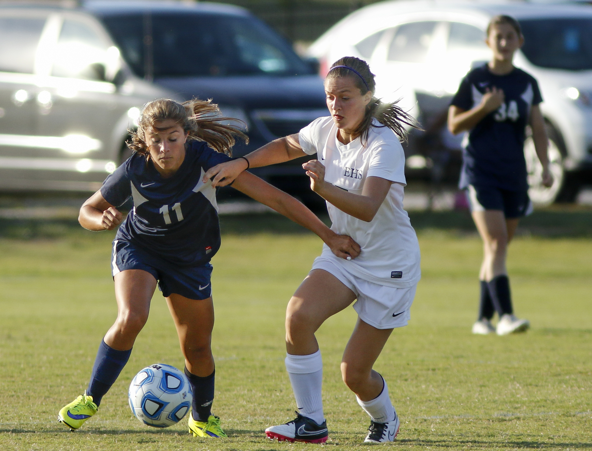East Hamilton's Lily Resmondo, right, and Soddy-Daisy's Soni Whalen fight to control the ball during their prep soccer match Tuesday, Sept. 15, 2015, at East Hamilton High School in Chattanooga, Tenn.