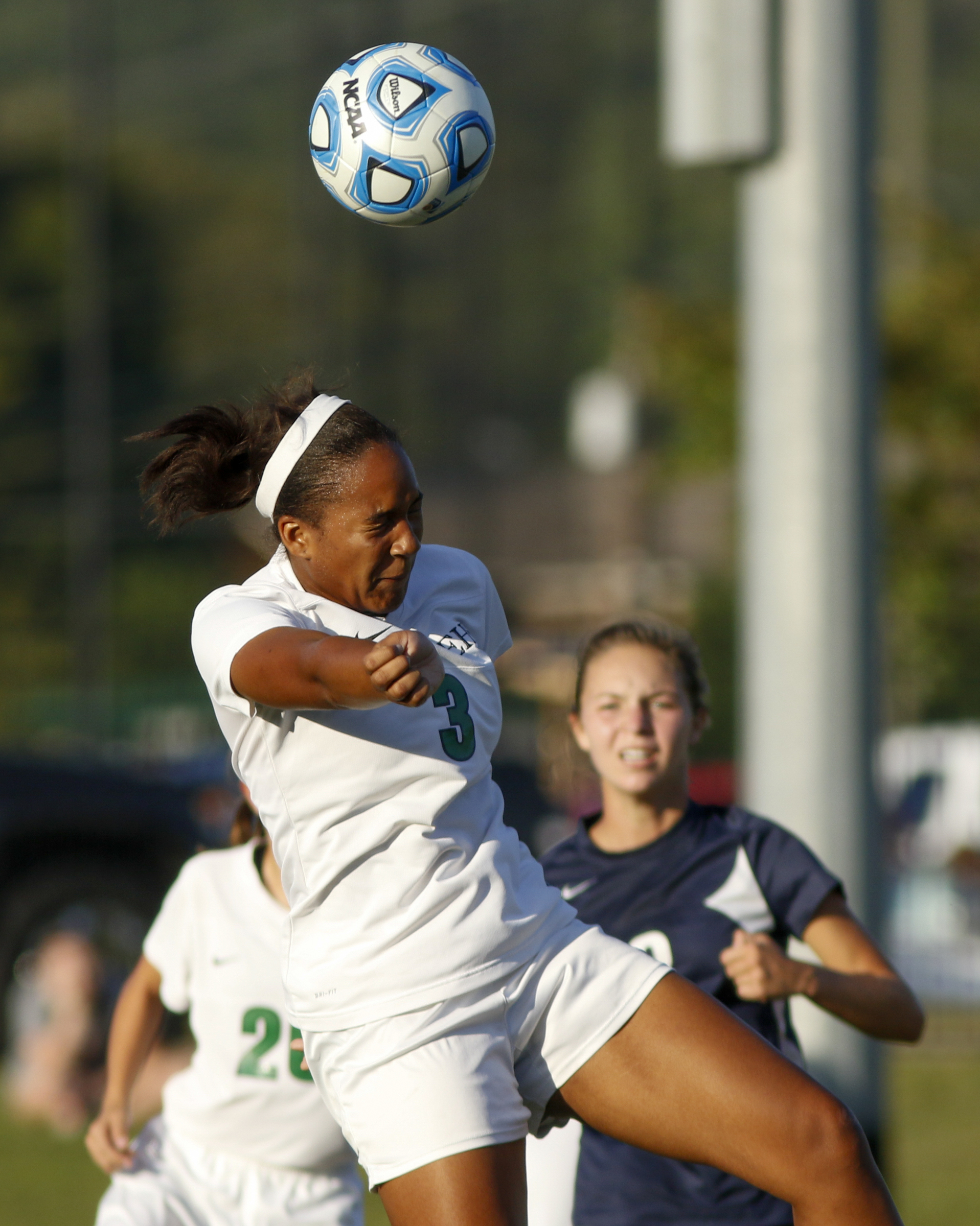 East Hamilton's Arielle Fortune, left, heads the ball ahead of Soddy-Daisy's Kelsey Henry during their prep soccer match Tuesday, Sept. 15, 2015, at East Hamilton High School in Chattanooga, Tenn.