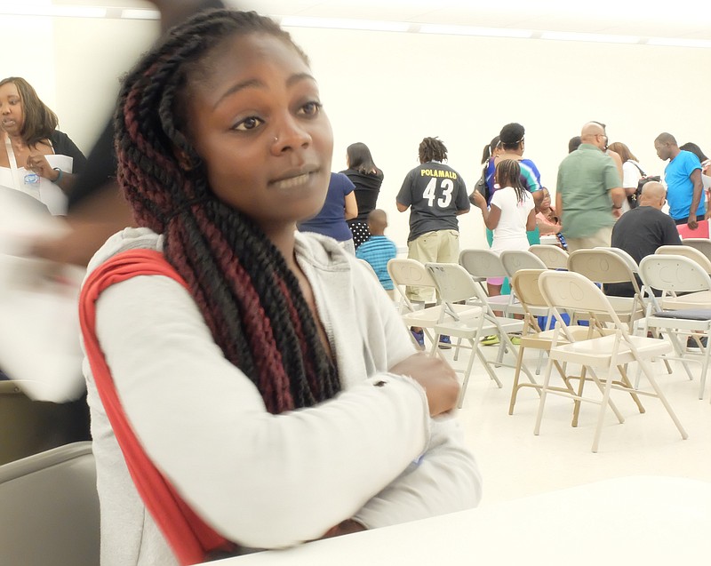 Bridgette Lewis, 26, says she wants to find a place to live in the Brainerd area where she grew up. Dozens of Section 8 approved attendees visited tables for a possible place to live Tuesday evening during the Tenant Landlord Fair sponsored by The Chattanooga Housing Authority. 