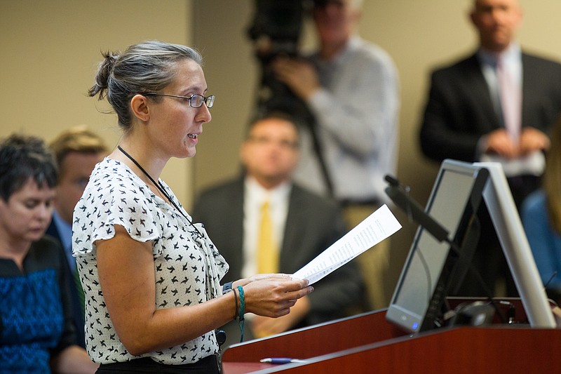 
              Andrea Zelinski, the news editor of the Nashville Scene and the president-elect of the state chapter of the Society of Professional Journalists, speaks at a hearing in Nashville, Tenn., on Wednesday, Sept. 16, 2015, in opposition to a legislative proposal to allow government officials to charge citizens to view public records. (AP Photo/Erik Schelzig)
            
