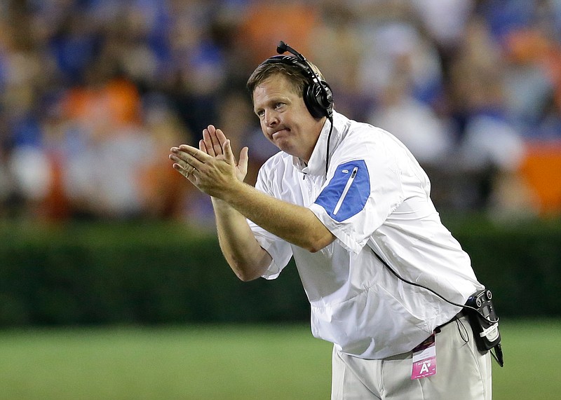 Florida first-year football coach Jim McElwain will try to lead the Gators to a 29th consecutive win over Kentucky on Saturday night in Lexington.