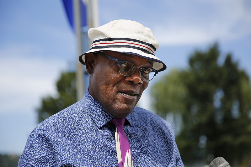 Samuel L. Jackson answers reporters' questions at MarineMax Marina near Ross's Landing before the Chattanooga Unite Tribute Concert on Wednesday, Sept. 16, 2015, in Chattanooga, Tenn. Jackson, a Chattanooga native, is emceeing the benefit concert for families of victims of the July, 16, shootings at military facilities in Chattanooga.