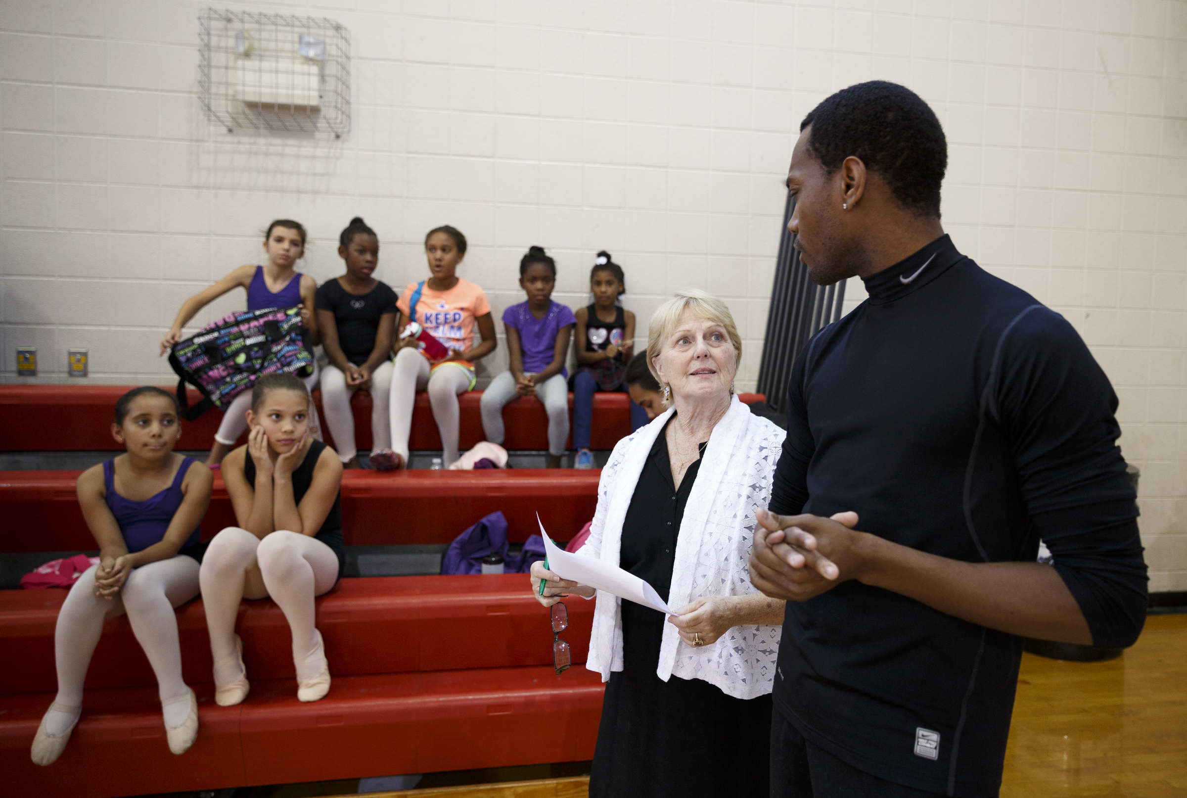 Anna Baker-VanCura, center, talks with her former dance student Fred Davis before Davis leads a master class in dance at the Brainerd Recreation Center on Tuesday, Sept. 15, 2015, in Chattanooga, Tenn. Davis, a Chattanooga native and Center for Creative Arts graduate, is now a professional dancer working in New York City.