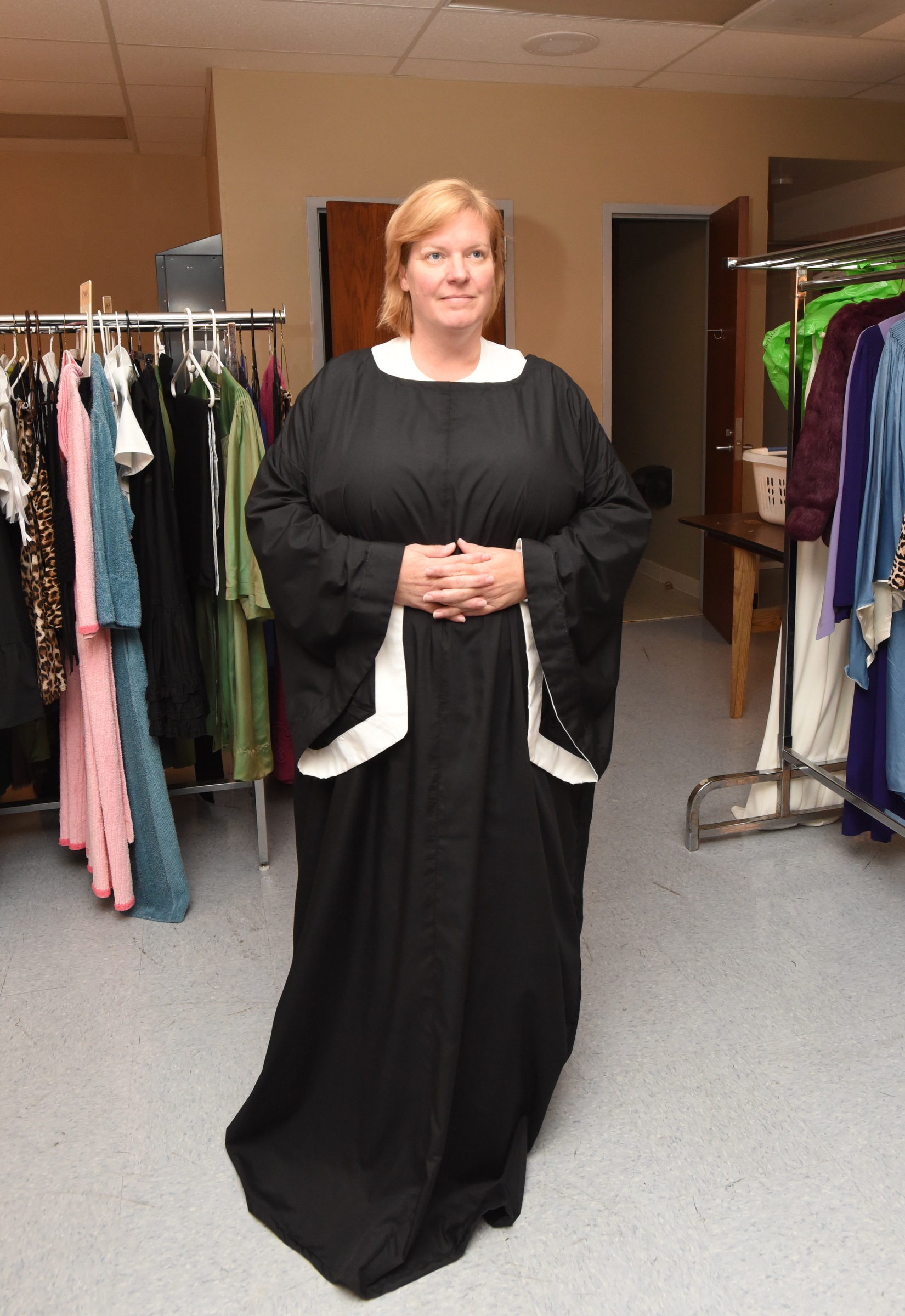 Actress Beth Gumnick, who plays Mother Superior in "Sister Act," wears the first layer of her costume.