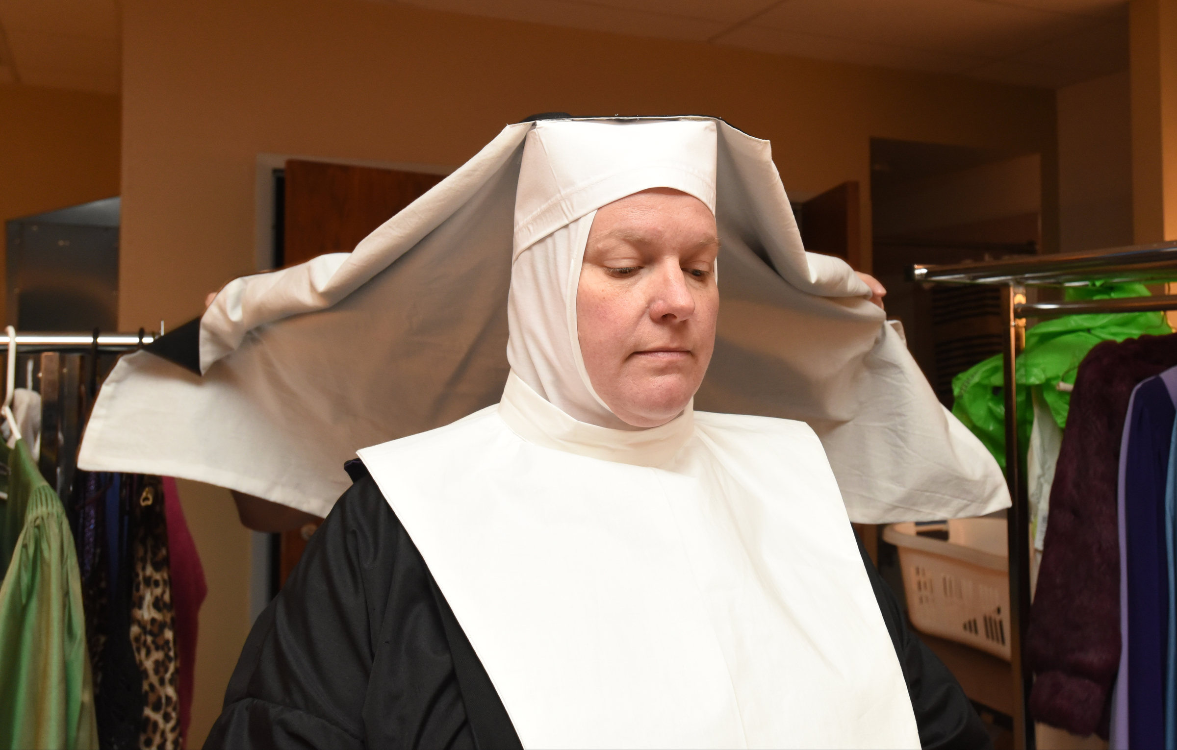 More adjustments to the veil so it will lay smoothly.