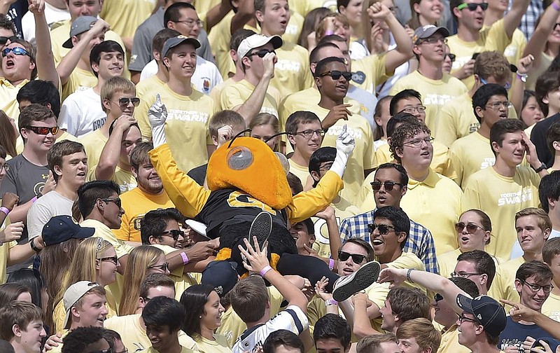 Buzz, Georgia Tech's mascot, crowd surfs with the help of Yellow Jackets fans during last week's win over Tulane in Atlanta. Times Free Press columnist Jay Greeson is optimistic about Tech's offense as the Jackets prepare to face Notre Dame in South Bend, Ind., this weekend.