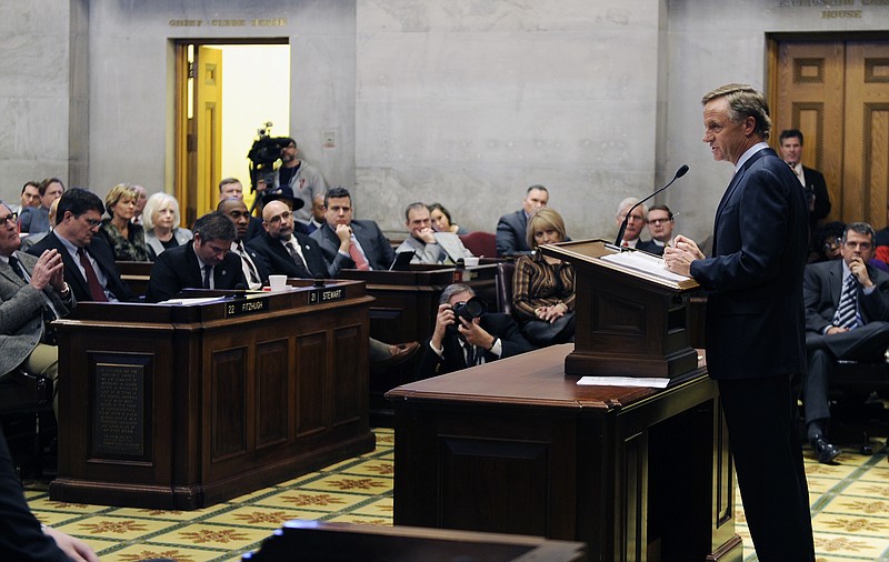 Tenn. Gov. Bill Haslam addresses the General Assembly in a joint, special session to kick off debate on the Insure Tennessee Medicaid plan on Monday Feb. 2, 2015, in Nashville, Tenn. (AP Photo/The Tennessean, Shelley Mays)