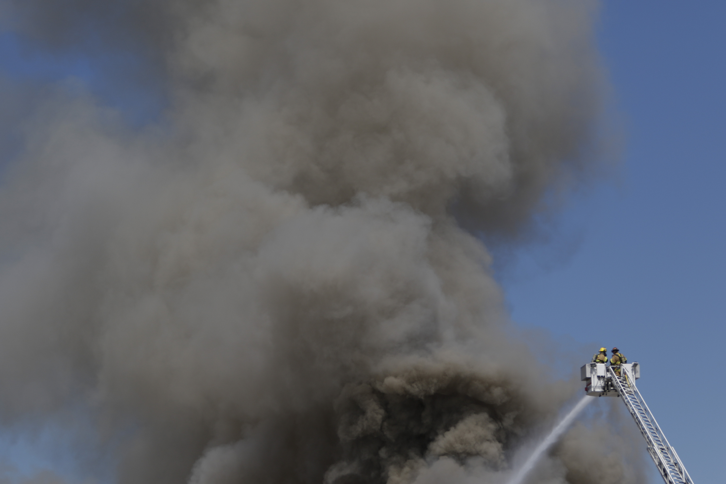 Chattanooga Fire Department firefighters respond to a blaze in a scrapyard off of Central Ave in downtown Chattanooga on September 17, 2015.