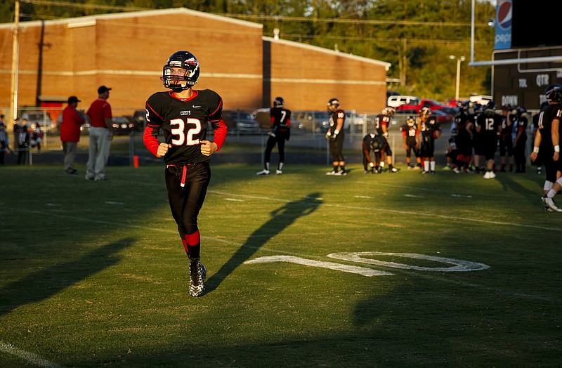 North Jackson player Canyon Gothard runs back to the group during warmups for their prep football game against DAR at North Jackson High School on Thursday, Sept. 17, 2015, in Stevenson, Ala.