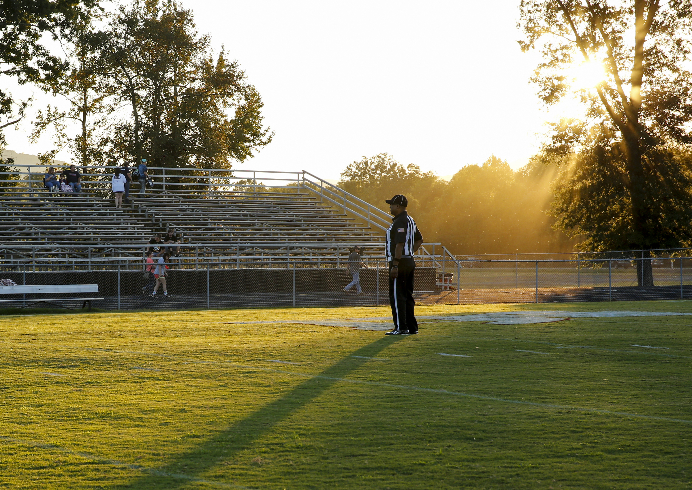 An official stands on the field before North Jackson's prep football game against DAR at North Jackson High School on Thursday, Sept. 17, 2015, in Stevenson, Ala.