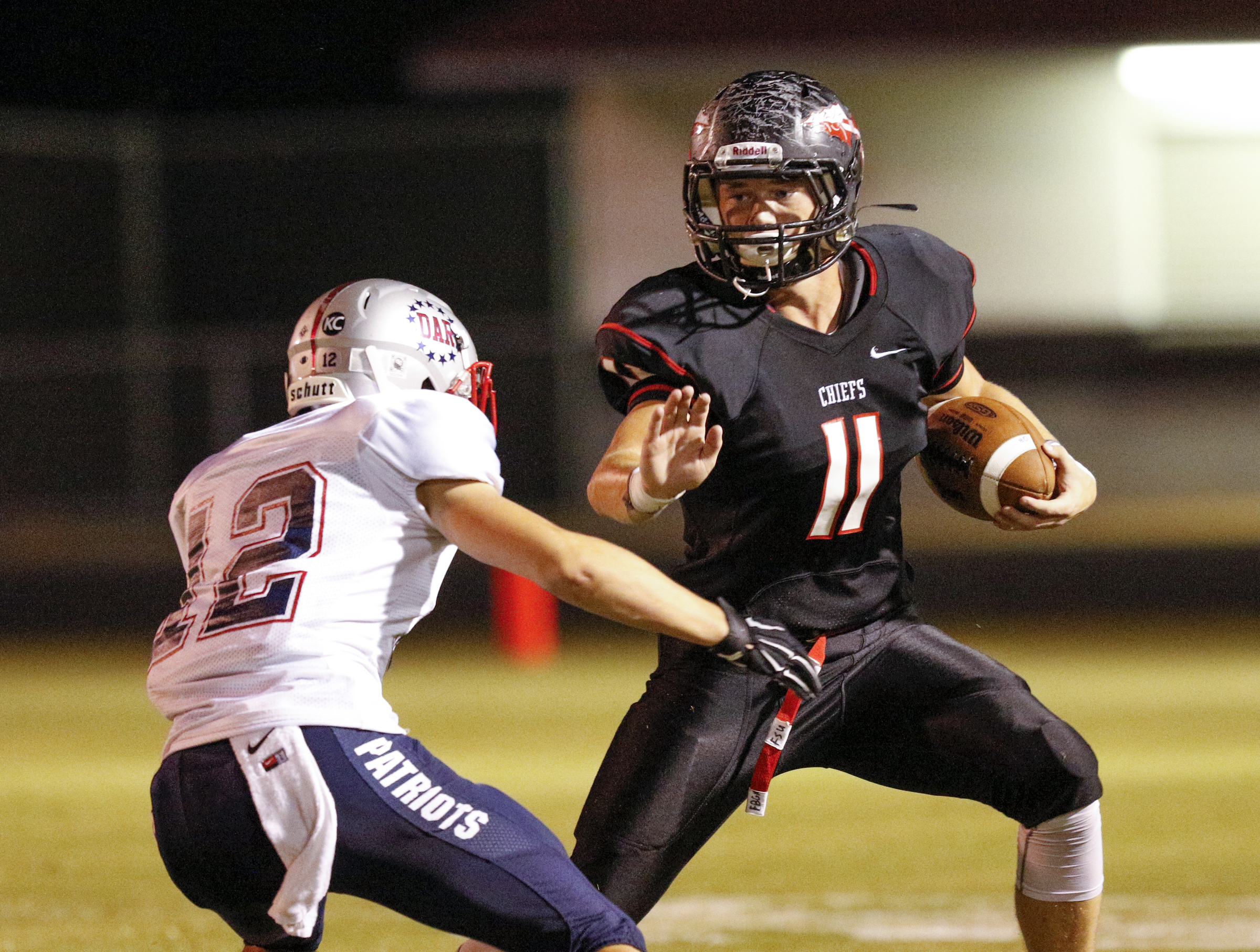 North Jackson tight end Chase Darnell looks for running room around DAR's Evan Borland during Thursday night's game in Stevenson, Ala.
