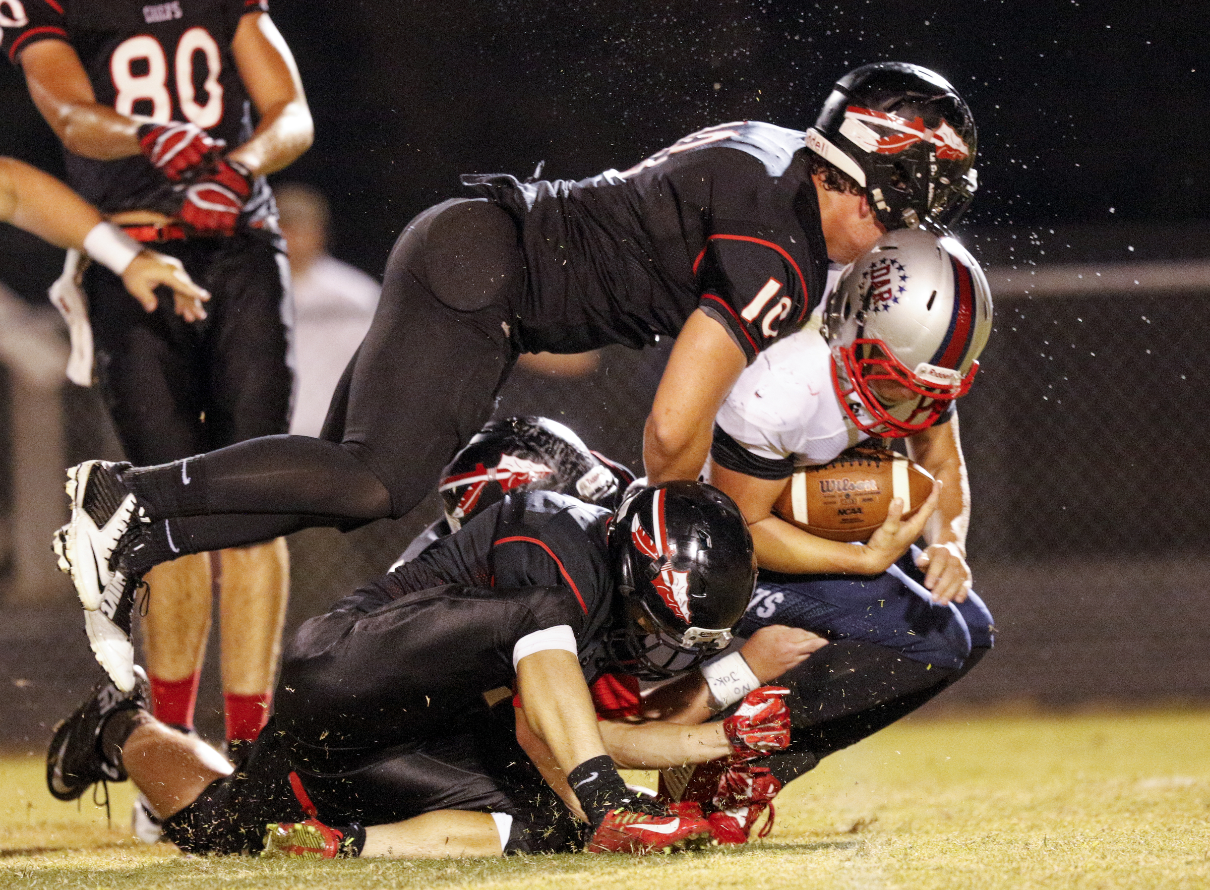 North Jackson defenders Gant Goings (10) and Brody Grider tackle DAR quarterback Troy Steele behind the line during their prep football game against DAR at North Jackson High School on Thursday, Sept. 17, 2015, in Stevenson, Ala.