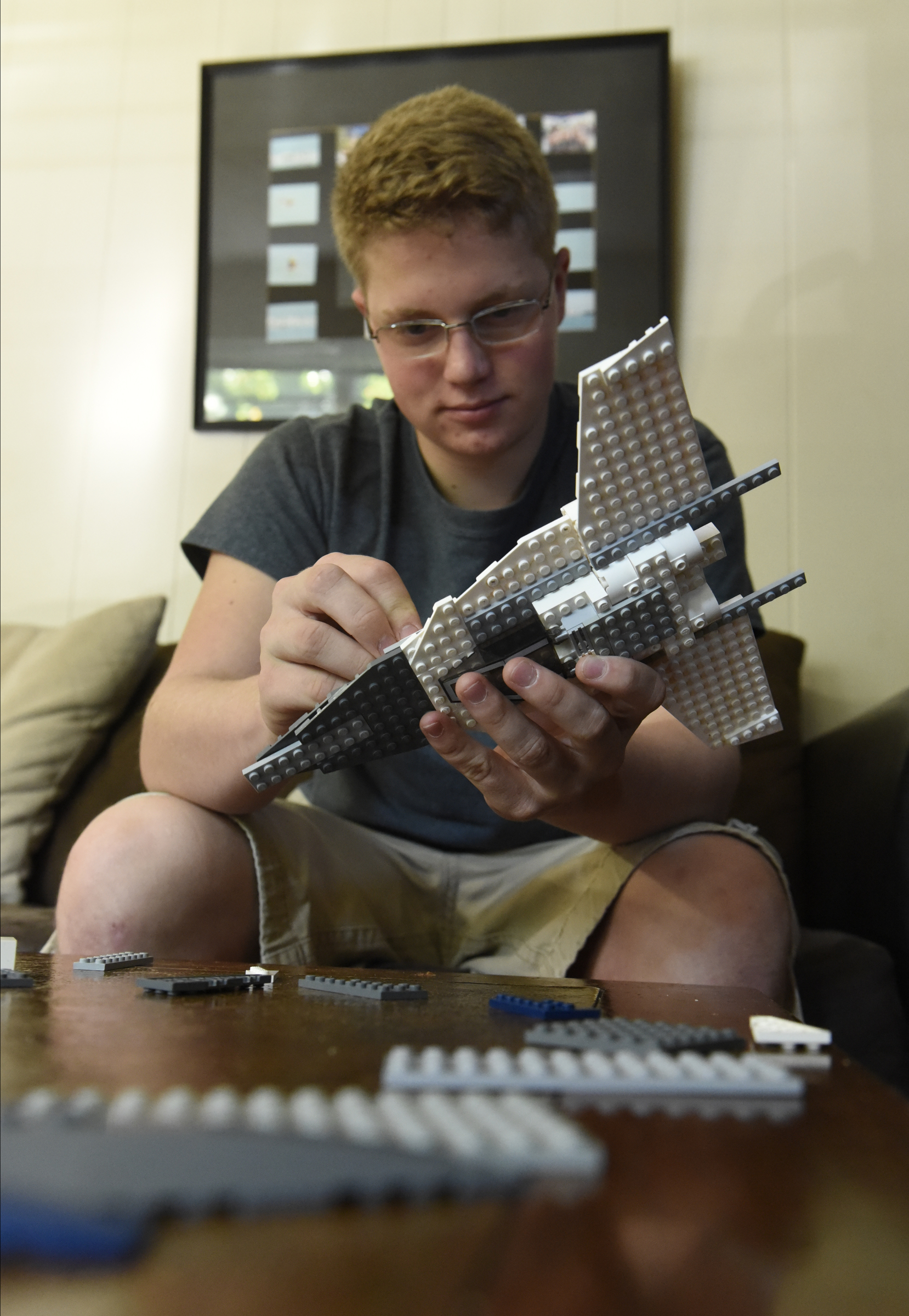 Gage Plotner works on a Lego model of a jet airplane on Thursday, Sept. 17, 2015, at his home in Soddy-Daisy, Tenn., one of his entries in the upcoming Hamilton County Fair.
