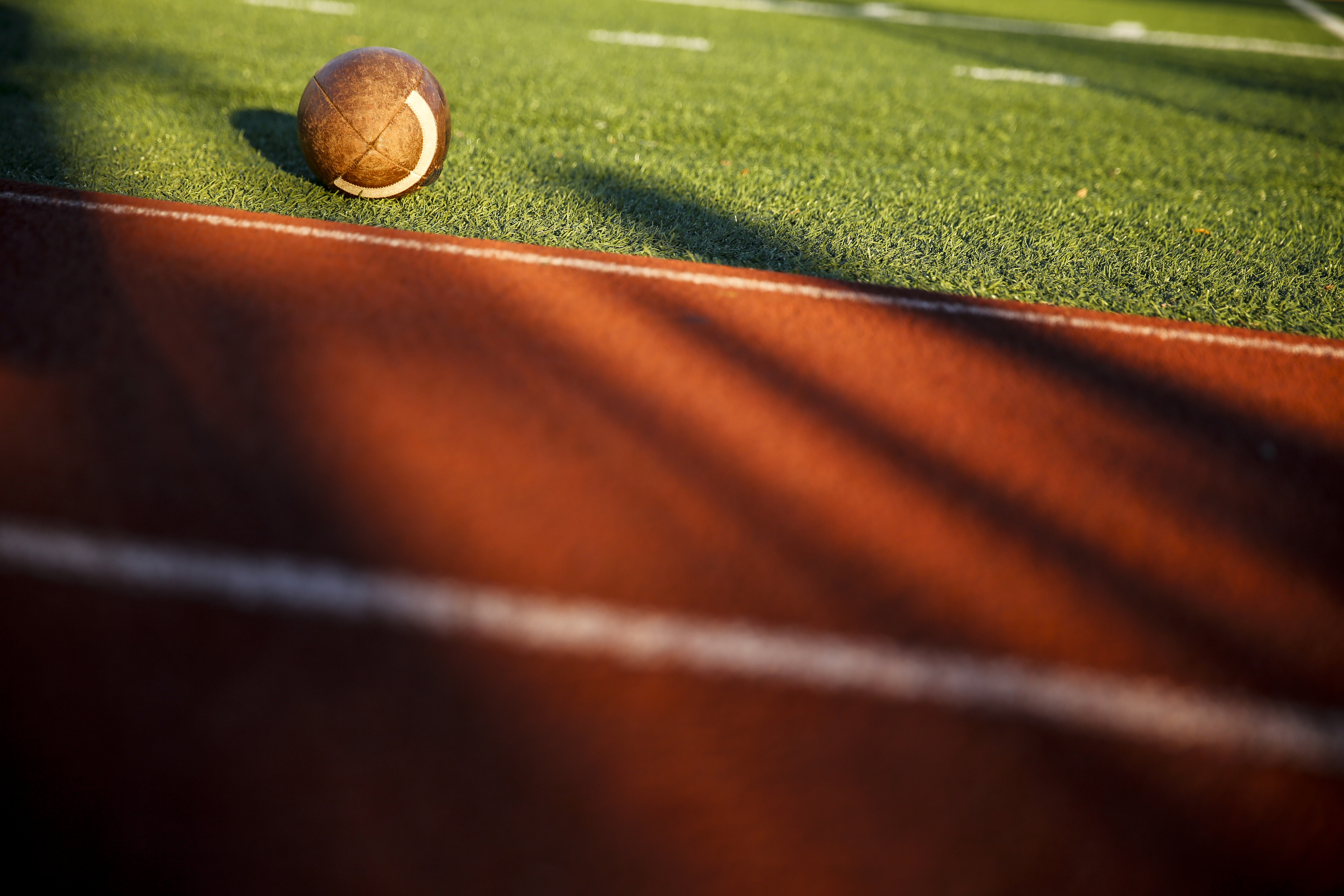A football is set aside on the sidelines before the McCallie tornados' prep football game against Montgomery Bell Academy at McCallie School on Friday, Sept. 18, 2015, in Chattanooga, Tenn.