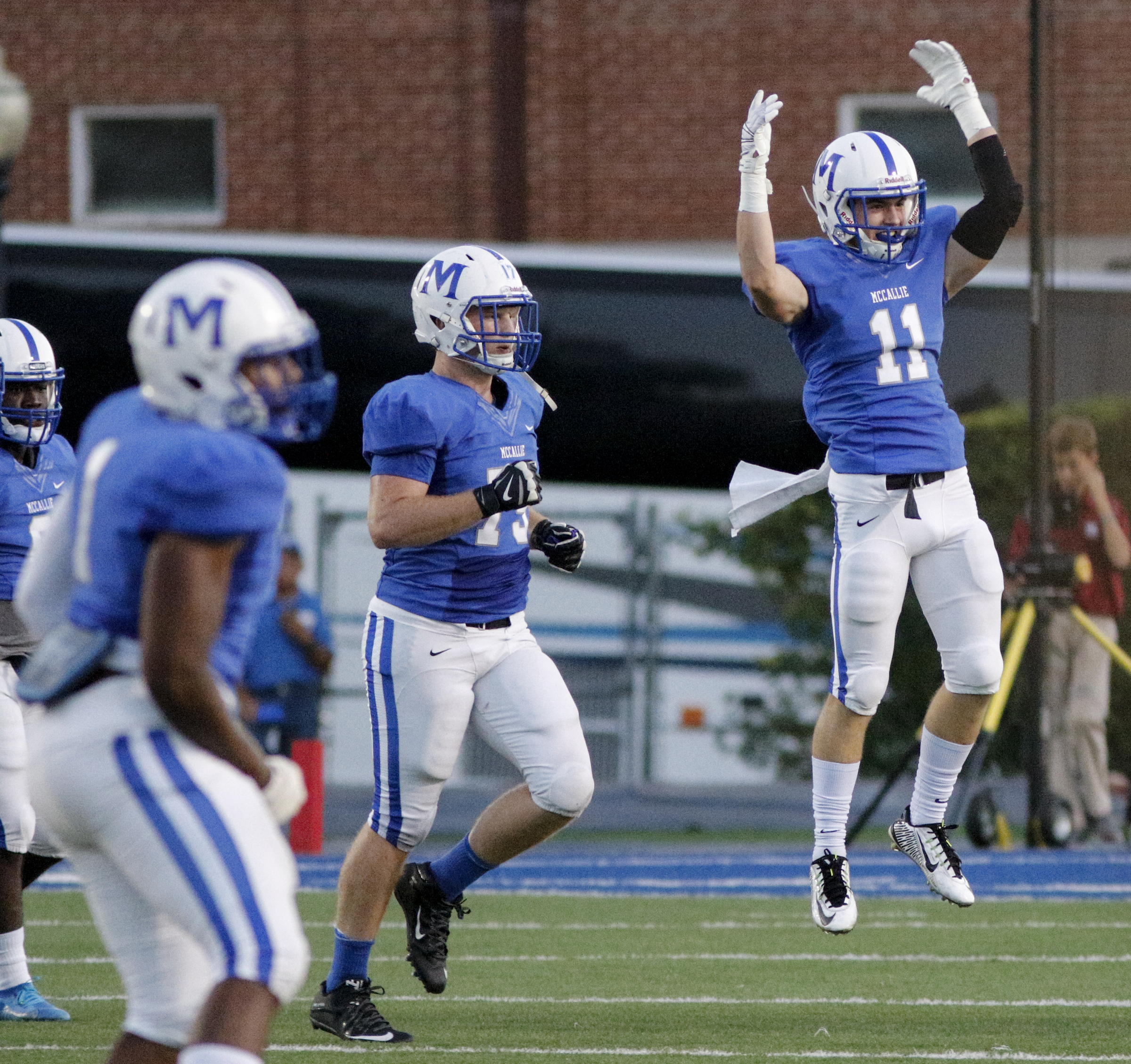 McCallie players celebrate recovering an MBA fumble during the tornados' prep football game against Montgomery Bell Academy at McCallie School on Friday, Sept. 18, 2015, in Chattanooga, Tenn.