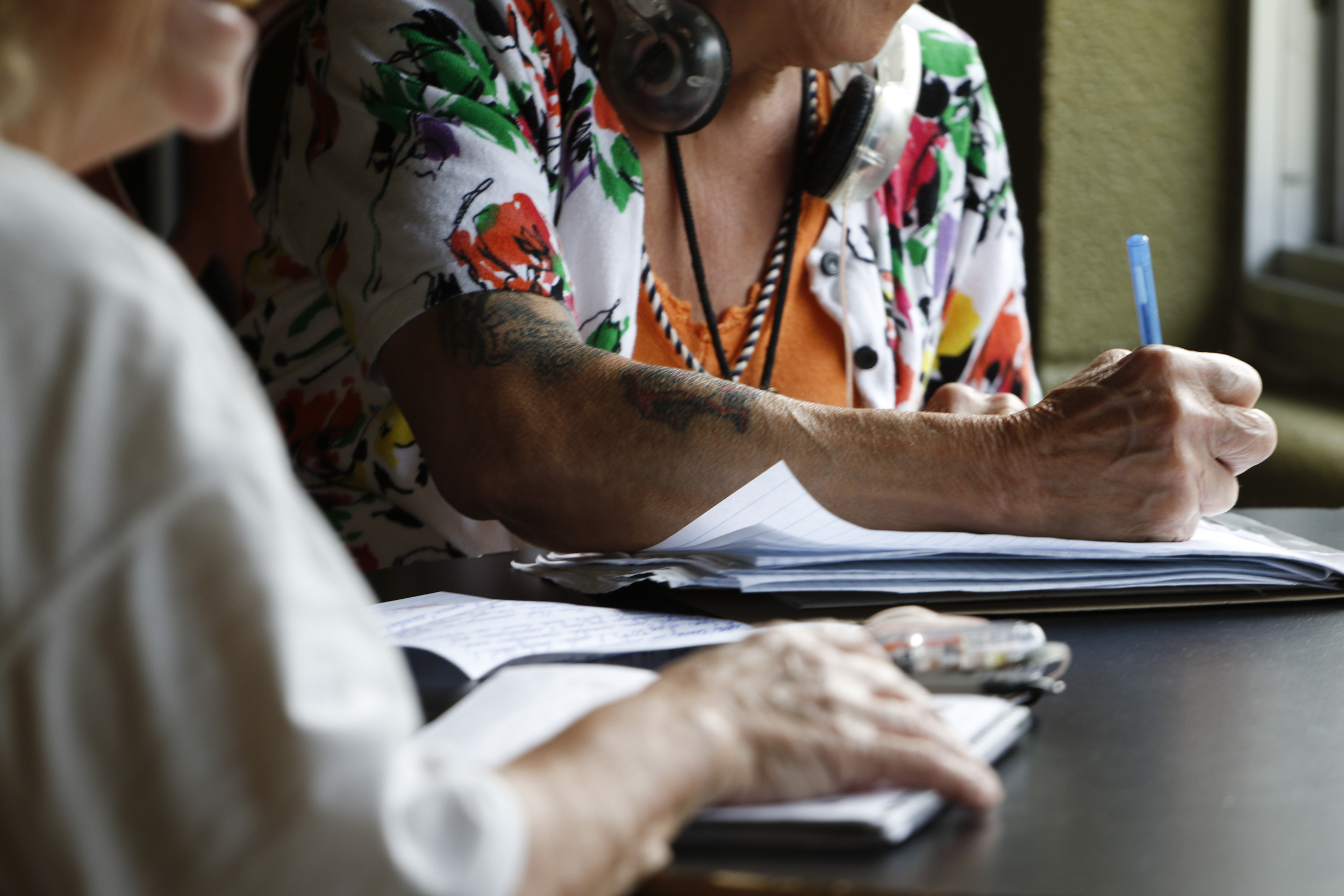 Clients at The Next Door write letters while at the local nonprofit on Wednesday, September 16, 2015. The local nonprofit works to reintroduce incarcerated women into society.