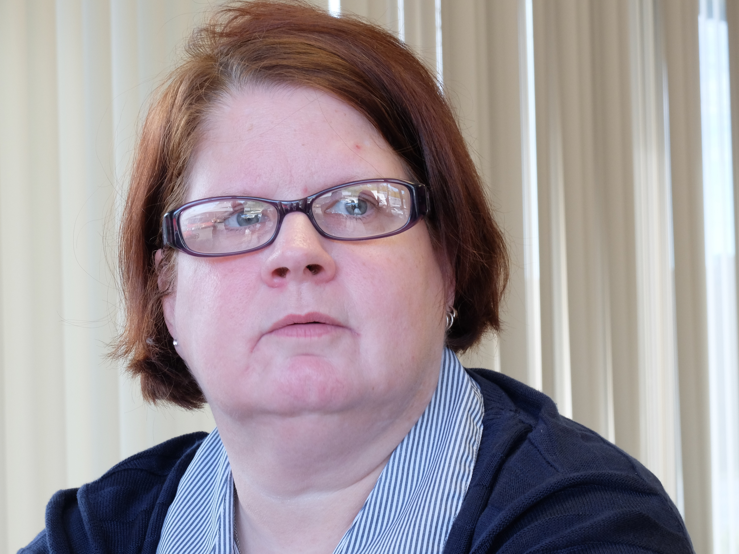 Donna Stephenson, 49, former state inmate, talks about her choices in life Thursday in the lobby at Brewer Media Group on Carter Street.