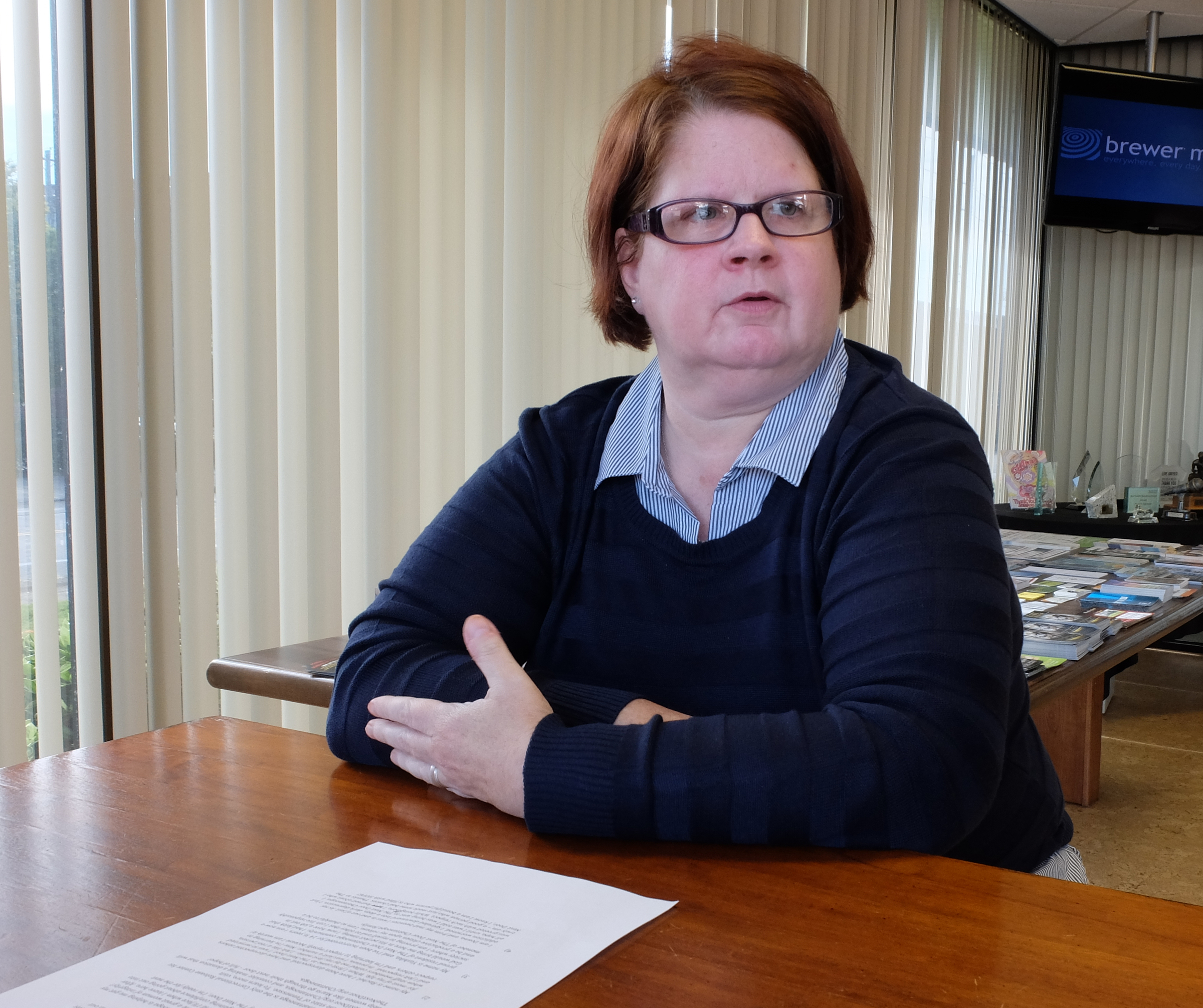 Donna Stephenson, 49, former state inmate, talks about her choices in life Thursday in the lobby at Brewer Media Group on Carter Street.