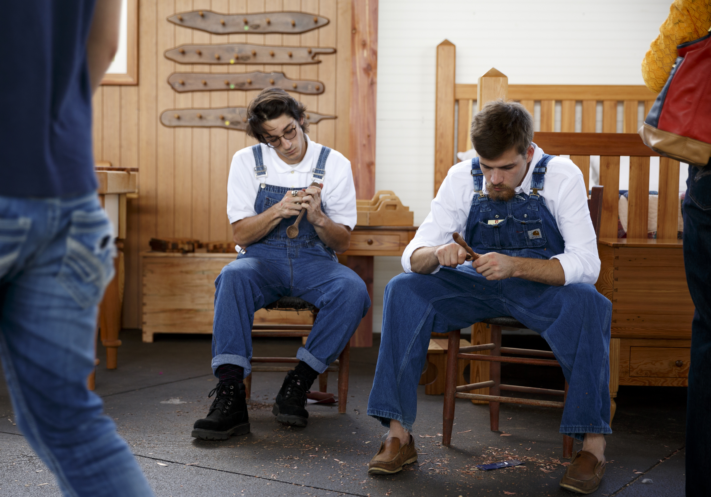 Jacob Caraccilo, left, and Will Peebles with the Chattanooga Woodworking Academy whittle at their booth at the Chattanooga Mini Maker Faire at the First Tennessee Pavilion on Saturday, Sept. 19, 2015, in Chattanooga, Tenn. The faire is a celebration of creators and their creations, and it showcased makers ranging from technology enthusiasts to crafts artisans.