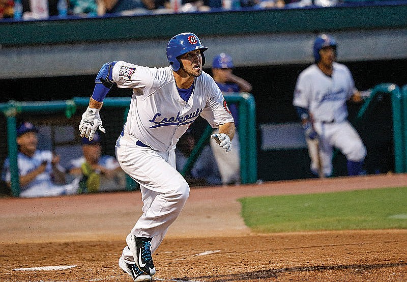 Chattanooga Lookouts batter DJ Hicks runs to first base during Saturday night's game against the Biloxi Shuckers in the Southern League championship series at AT&T Field. The Lookouts lost 2-0, giving the Shuckers a 2-1 edge in the best-of-five series. Game 4 is at 2:15 this afternoon in Chattanooga. If necessary, the series' fifth game will be played at 7:15 p.m. Monday, also at AT&T Field.