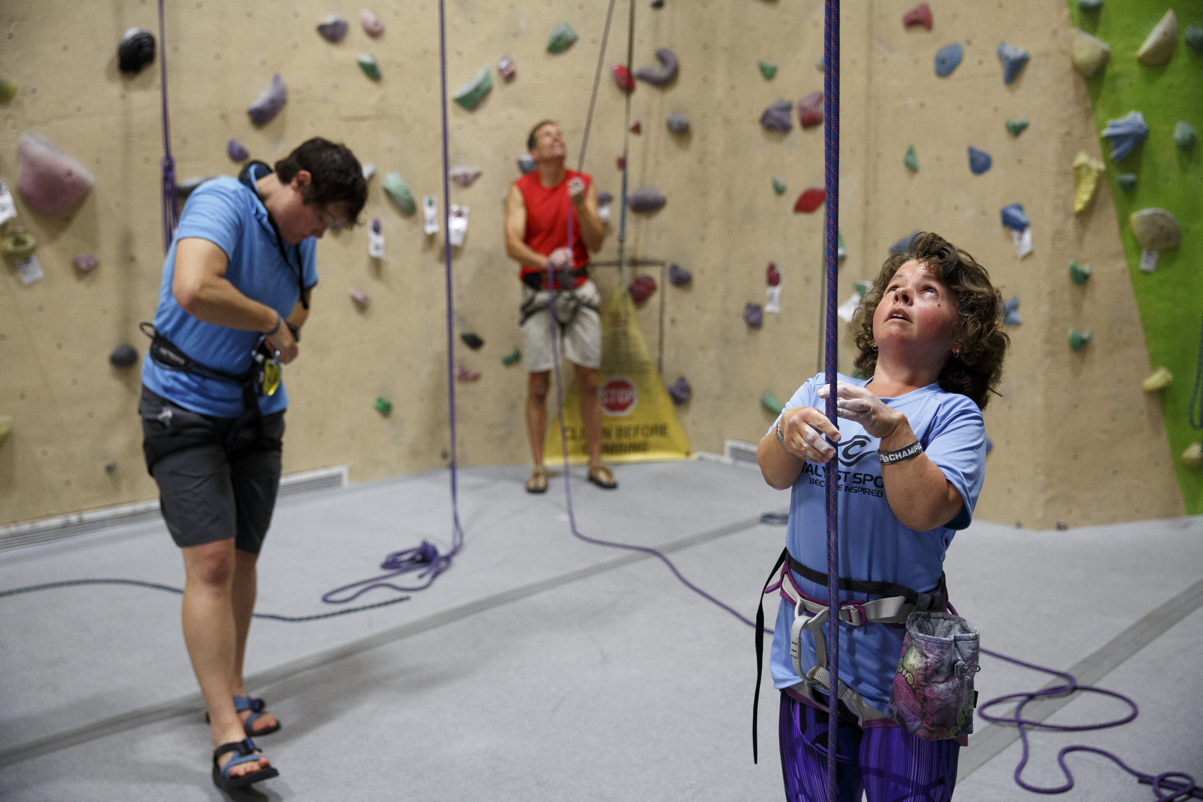 Sharon Stolberg, right, prepares to tie in to a route while Schandra Loveless, left, gets ready to belay during an adaptive climbing program at High Point Climbing gym Thursday, Sept. 17, 2015, in Chattanooga, Tenn. The program, which happens on the third Thursday of each month, provides resources to help disabled climbers enjoy the sport.