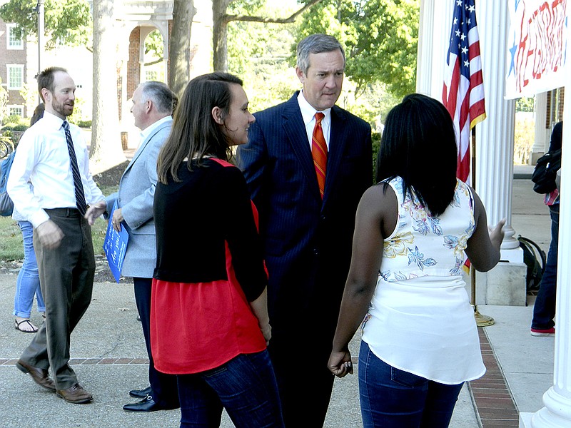 Tennessee Secretary of State Tre Hargett engages Indyasia Johnson, chair of Lee University's Student Leadership Council, right, and Madison Dressler, secretary of the council's Student Learning Committee, during a tour of campus voter registration events on Friday.
