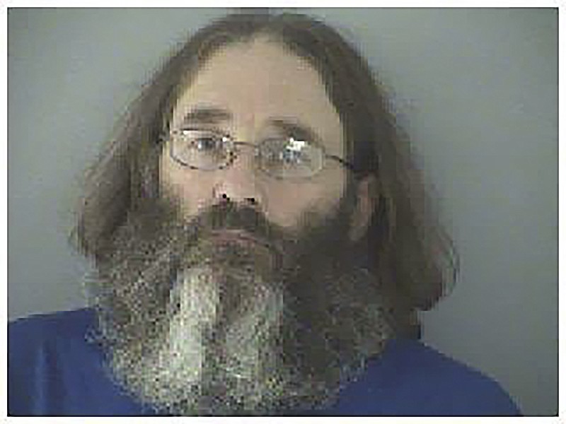 
              This undated photo made available by the Butler County Jail shows James Hammes. Arrested by federal agents in May 2015 at Damascus, Va., near the Appalachian Trail, Hammes is facing federal trial in Cincinnati in October for embezzlement. He had been a fugitive for six years, hiking under the name "Bismarck." (Butler County Jail via AP)
            