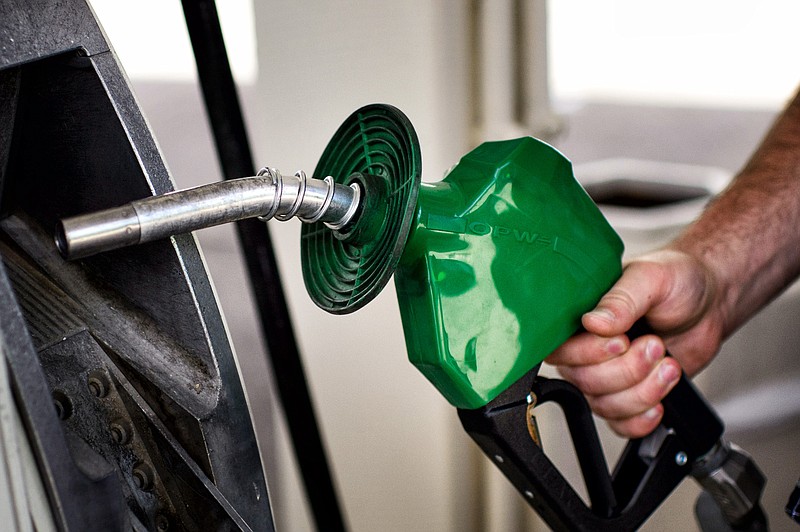 A customer fills up their car at a BP gas station in South Minneapolis, Min., on Friday, Sept. 4, 2015.