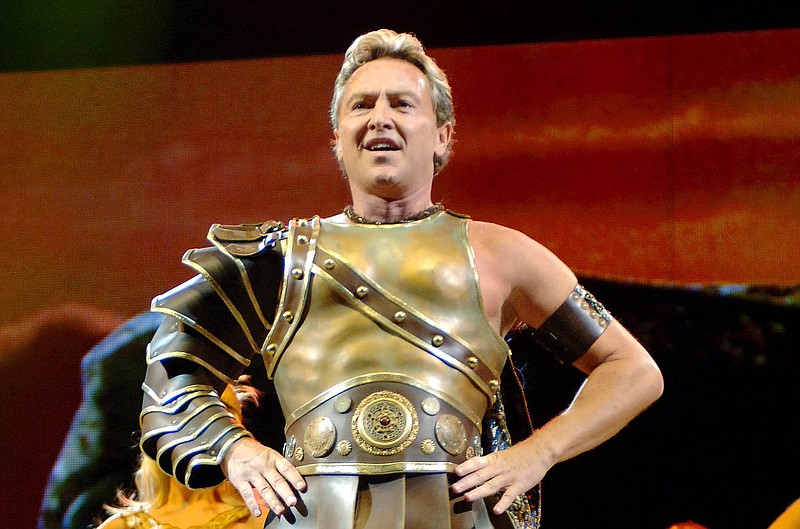 
              FILE - In this Sept. 27, 2005 file photo, Irish American dancer Michael Flatley, known for his works River Dance and Lord of the Dance, performs at Madison Square Garden, in New York. Flatley, who helped spark a worldwide Celtic dance craze, will make his long-awaited Broadway stage debut in November with “Lord of the Dance: Dangerous Games." (AP Photo/Henny Ray Abrams, File)
            