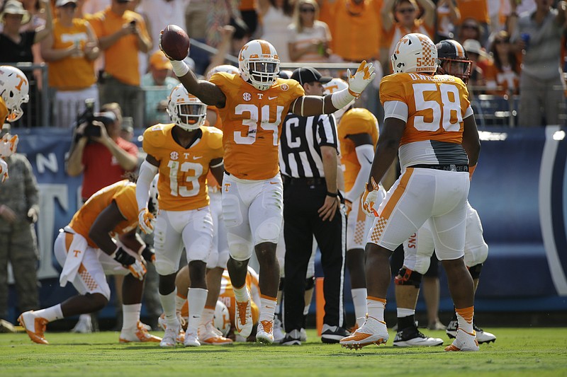 Tennessee linebacker Darrin Kirkland (34) celebrates after a play in the first half of an NCAA college football game against Bowling Green Saturday, Sept. 5, 2015, in Nashville.