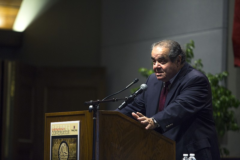 
              U.S. Supreme Court Justice Antonin Scalia addresses an audience at Rhodes College, Tuesday, Sept. 22, 2015 in Memphis, Tenn. Justice Scalia's 2015 Constitution Day lecture is called "Constitutional Interpretation." (Yalonda M. James/The Commercial Appeal via AP)
            