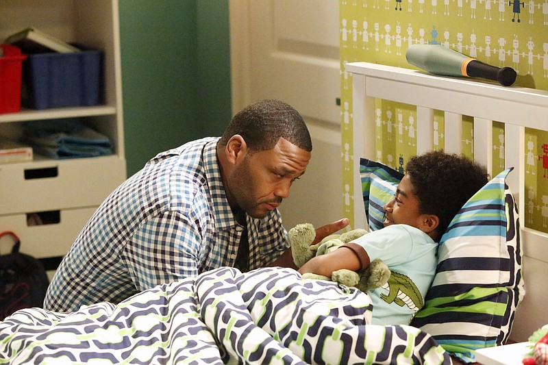 
              In this image released by ABC, Anthony Anderson, left, and Miles Brown appear in a scene from the family comedy "Black-ish." On the episode titled, "The Word," airing Wednesday, Sept. 23, Jack, portrayed by Brown, performs a song at a school talent show with a controversial lyric that leads to his possible expulsion from school. (Kelsey McNeal/ABC via AP)
            