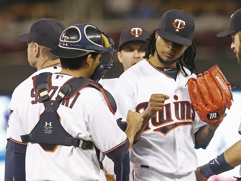 Twins win behind Santana