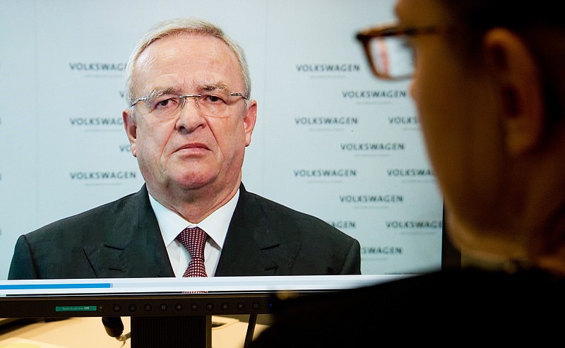 A woman watches a video statement by Volkswagen AG  CEO Martin Winterkorn, on the company's website, in Hanover, Germany, Tuesday Sept. 22, 2015. Winterkorn apologized for the manipulations of VW diesel cars in the U.S. to defeat emission tests , and promised a fast and thorough investigation. (Julian Sratenschulte/dpa via AP)
