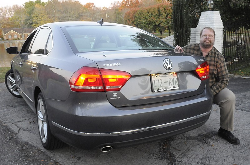 Stephen Thomas poses with his new diesel Passat in this 2011 file photo.