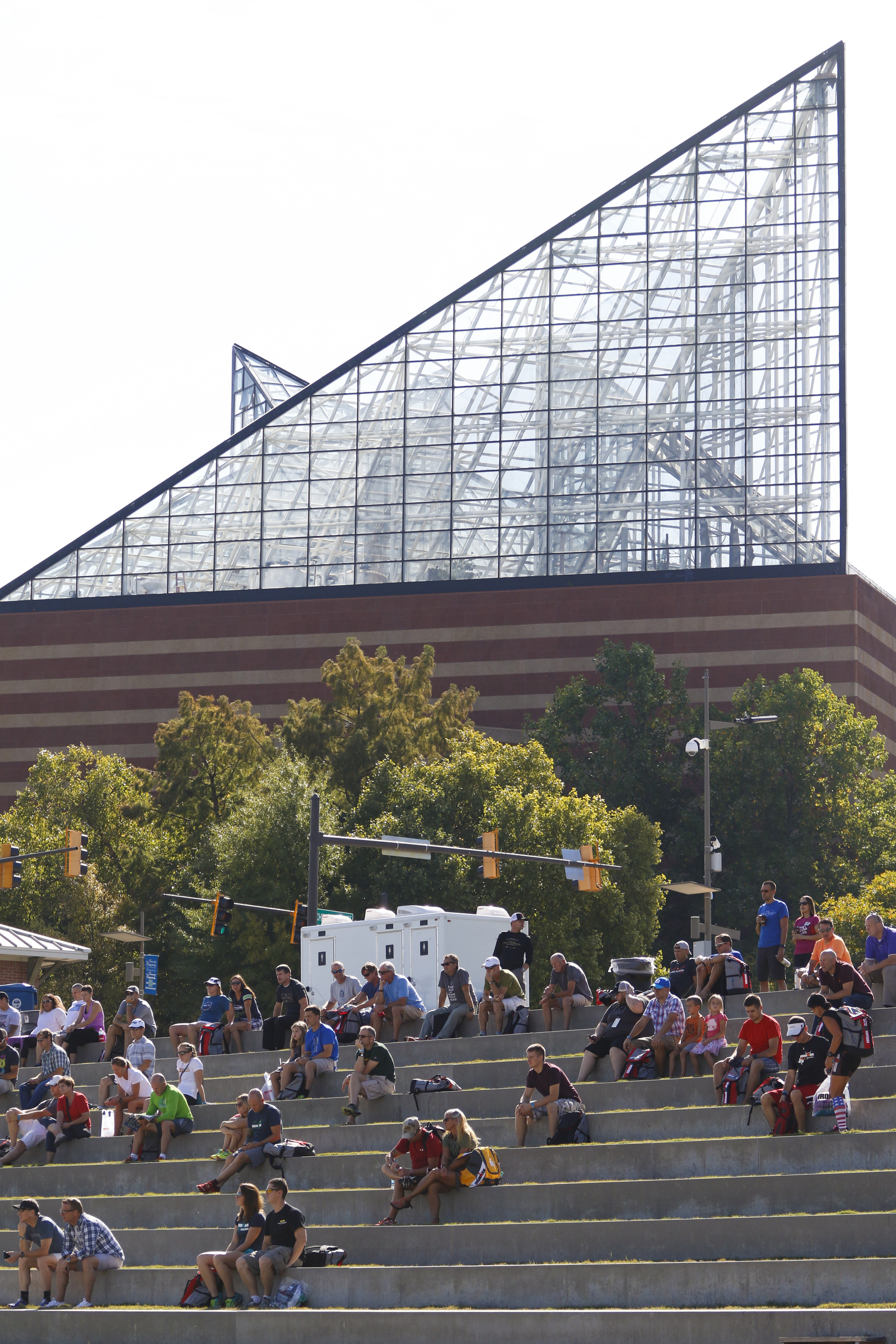 Competitors listen to the first athlete briefing meeting of the day in preparation for the second annual Ironman Chattanooga triathlon which will take place Sunday, September 27, 2015.