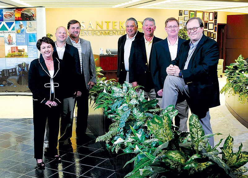 The Santek management team includes, from left, Cheryl Dunson, executive vice president of marketing; Ron Vail, vice president of engineering; Matt Dillard, executive vice president of operations; Jim Gleeson, chief financial officer; Eddie Caylor, chief business development officer; Tim Watts, chief operating officer; and Kenneth D. Higgins, chief executive officer.