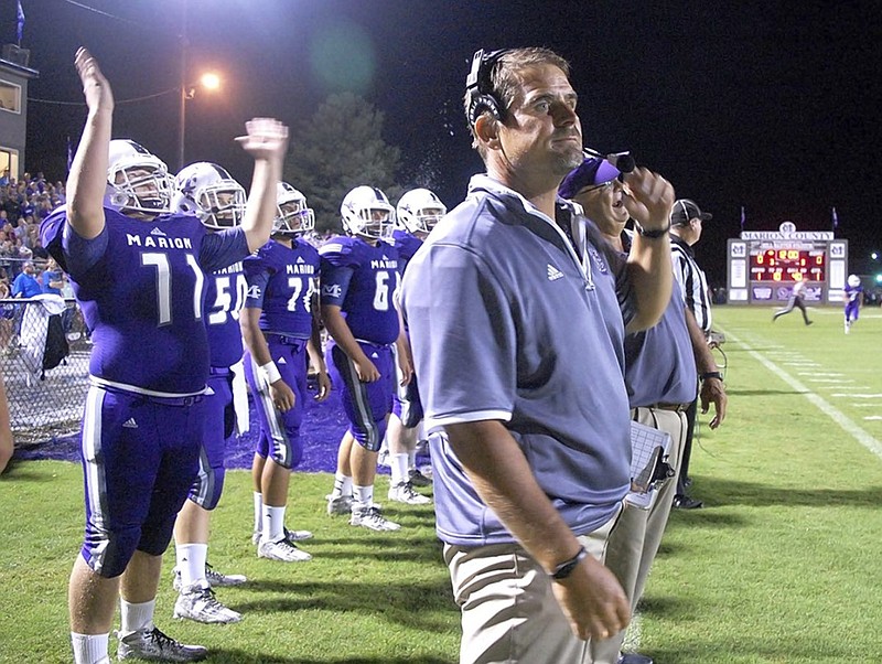 Marion County High School football coach Ricky Ross and his Warriors, Class 2A's top-ranked team, travel to face second-ranked Boyd-Buchanan tonight.