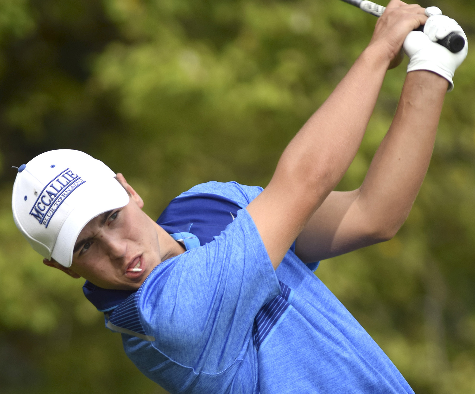 McCallie's Christopher Burkhart follows through on his tee shot.  Baylor faced McCallie in match play golf at the Lookout Mountain Golf Club on Thursday, September 24, 2015.