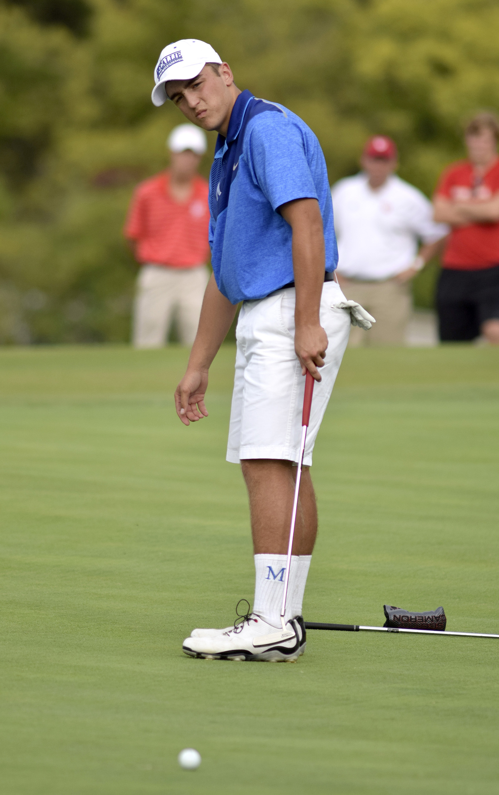 McCallie's Christopher Burkhart watches the progress of his putt.  Baylor faced McCallie in match play golf at the Lookout Mountain Golf Club on Thursday, September 24, 2015.