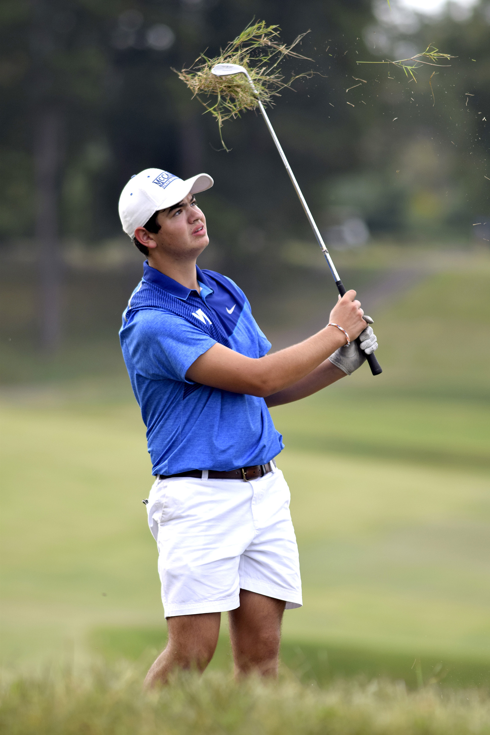 Grace covers the face of McCallie's Evan Spence after he chips from the rough.  Baylor faced McCallie in match play golf at the Lookout Mountain Golf Club on Thursday, September 24, 2015.