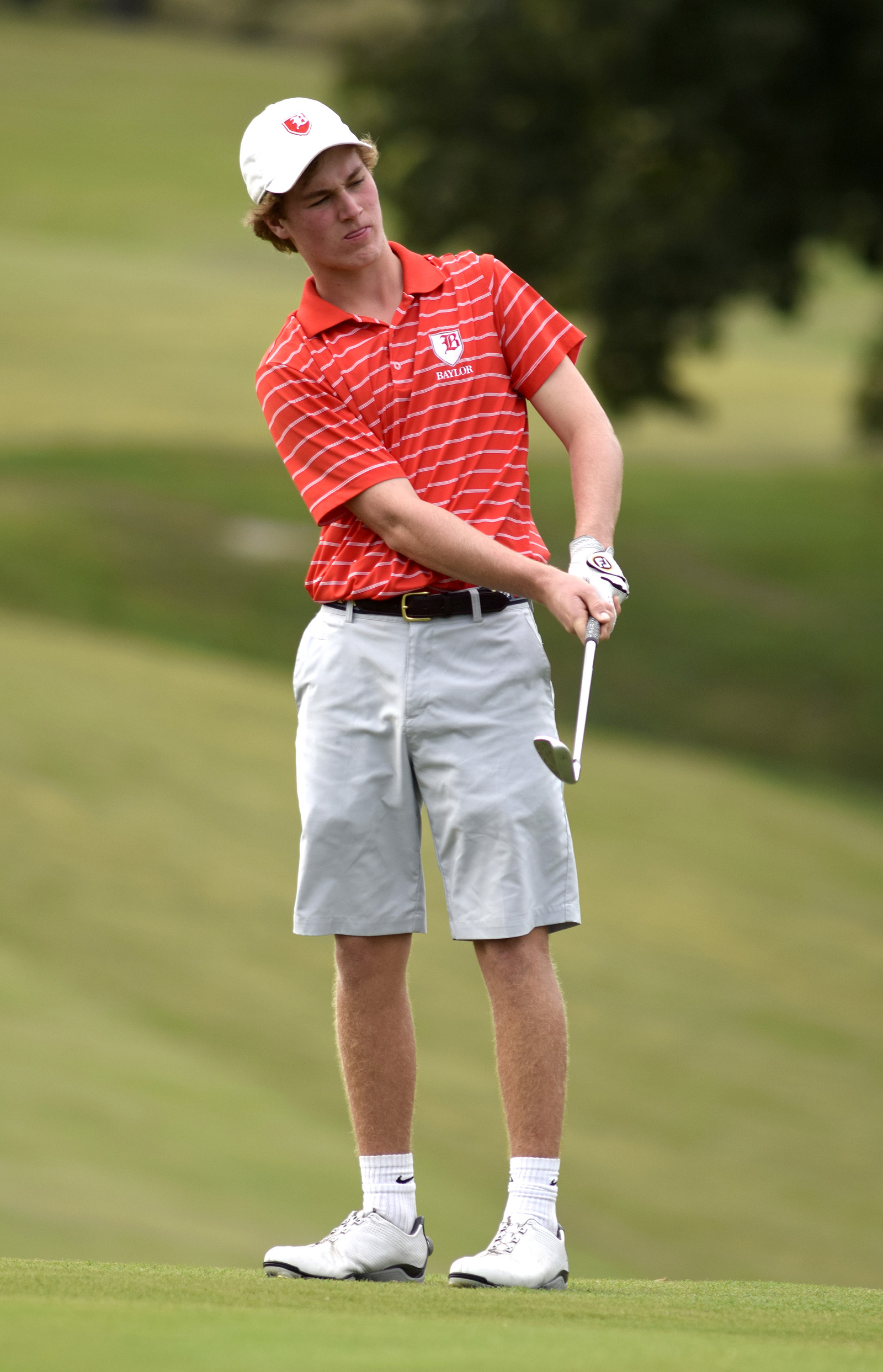 Baylor's Chase Roswall watches as his chip shot rolls toward the hole.  Baylor faced McCallie in match play golf at the Lookout Mountain Golf Club on Thursday, September 24, 2015.