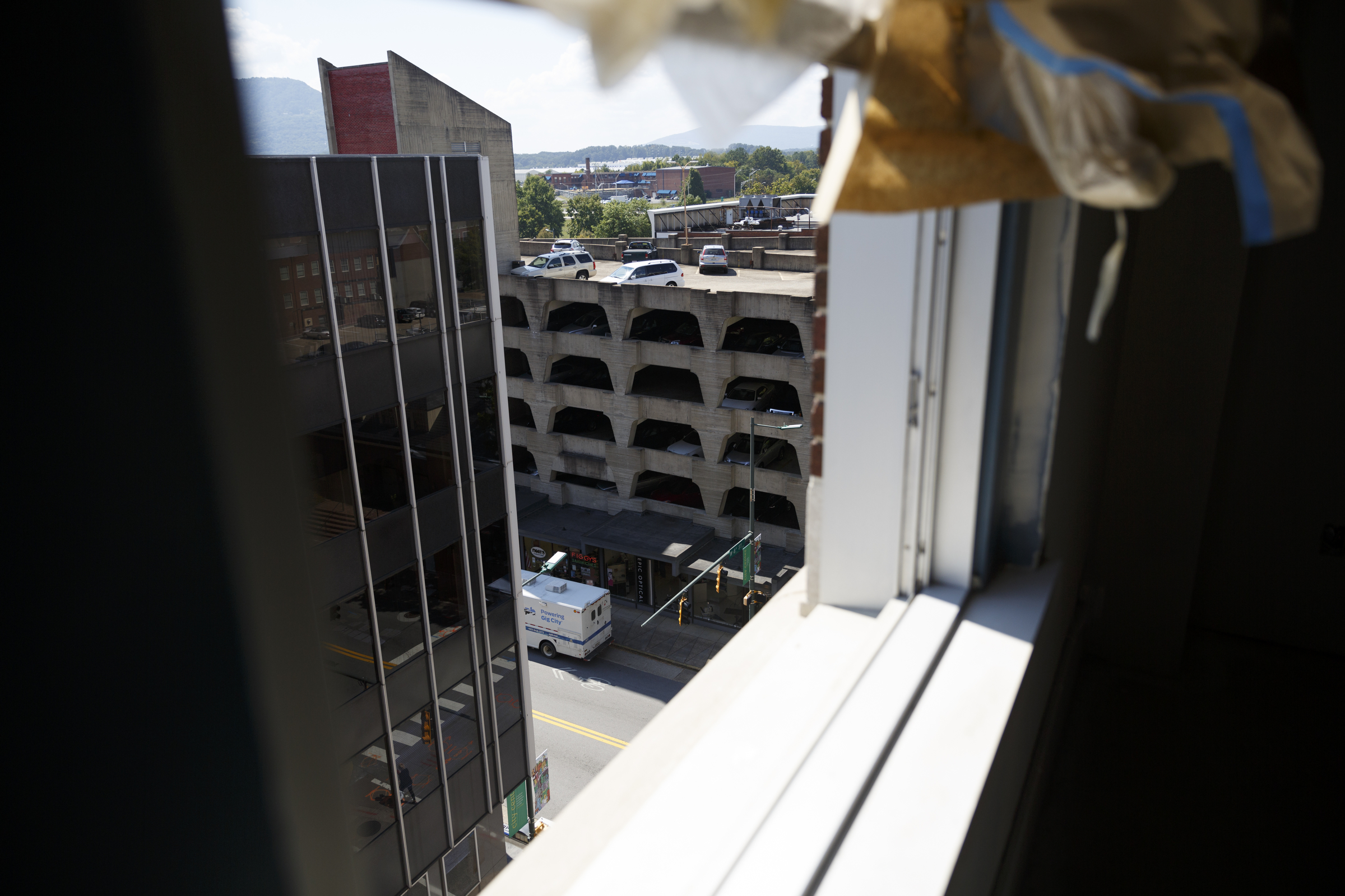 The view from a 2-bedroom loft which looks over 8th street at the Clemons building Wednesday, Sept. 23, 2015, in Chattanooga, Tenn. The building, which dates back to the early 1920s, is being restored to offer luxury downtown loft apartments by owner and developer Vic Desai.